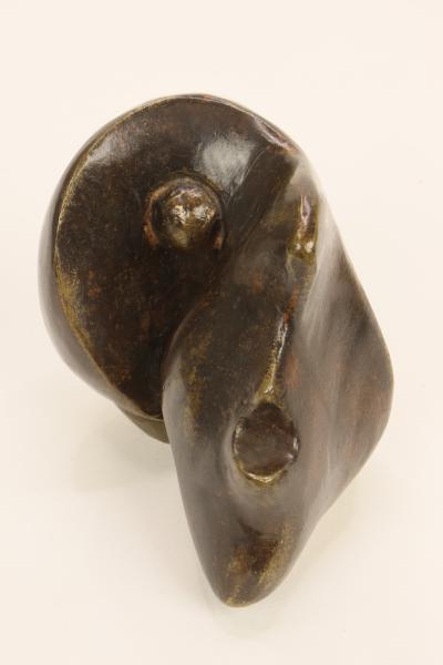 Tête et son oreiller - Bronze patiné - H 5cm.JPG